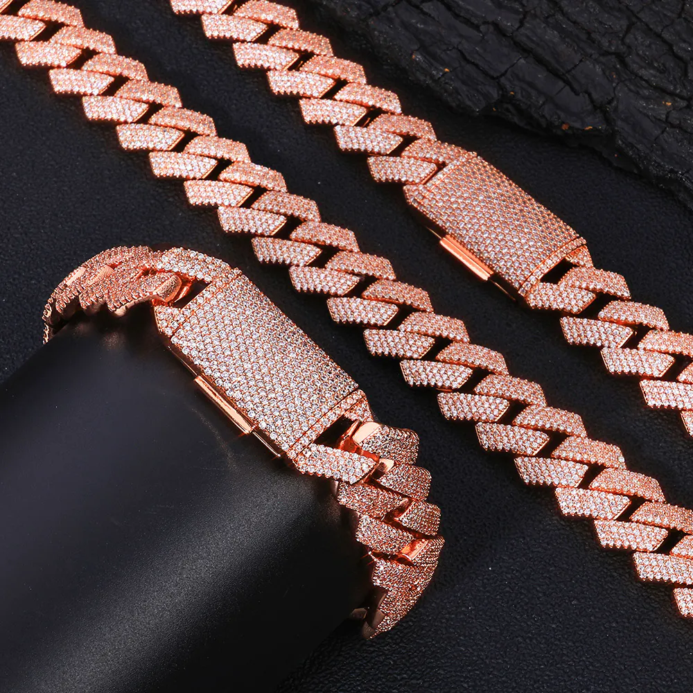 close-up detail of 4-row CZ stones on brass cuban chain showing sparkle under light