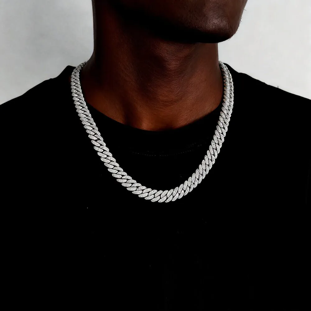 Man wearing a iced-out CZ Miami Cuban Link necklace, urban street style hip hop chain for men.
