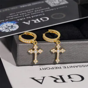 Yellow gold iced cross hoop earrings front view on GRA background