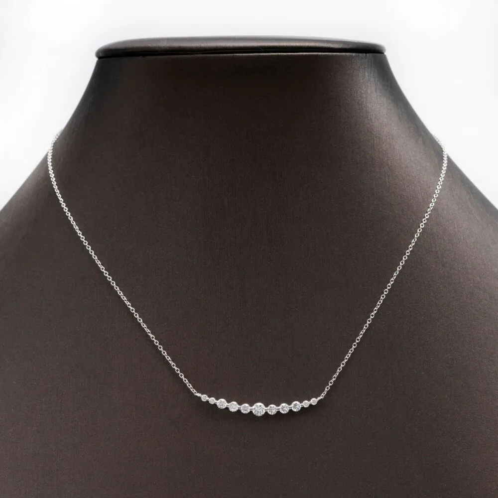 Moissanite partial graduated necklace shown on model