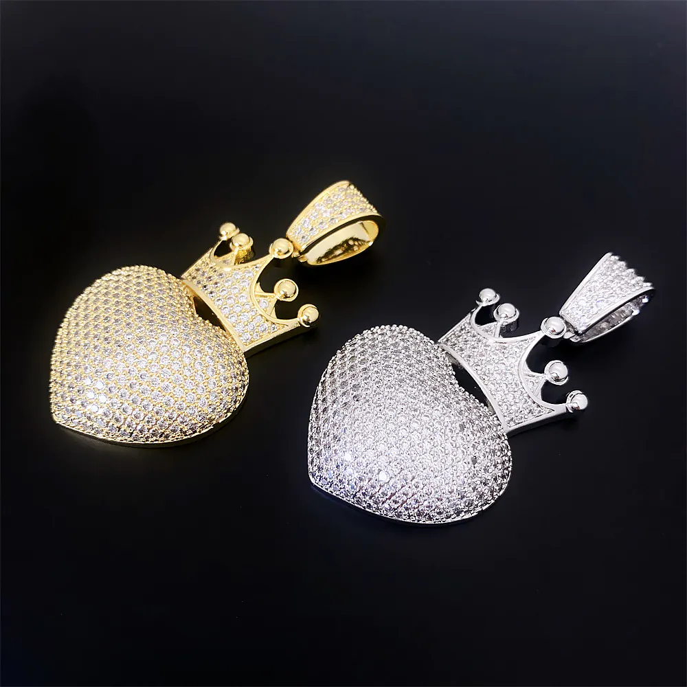 close up of curved heart pendant showing smooth surface and flat paved cz setting