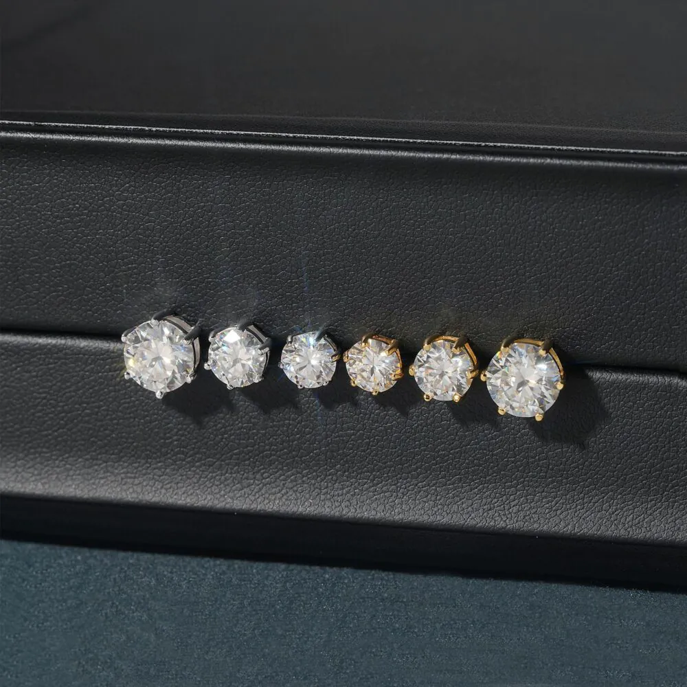 Different carat sizes of moissanite solitaire stud earrings on black background